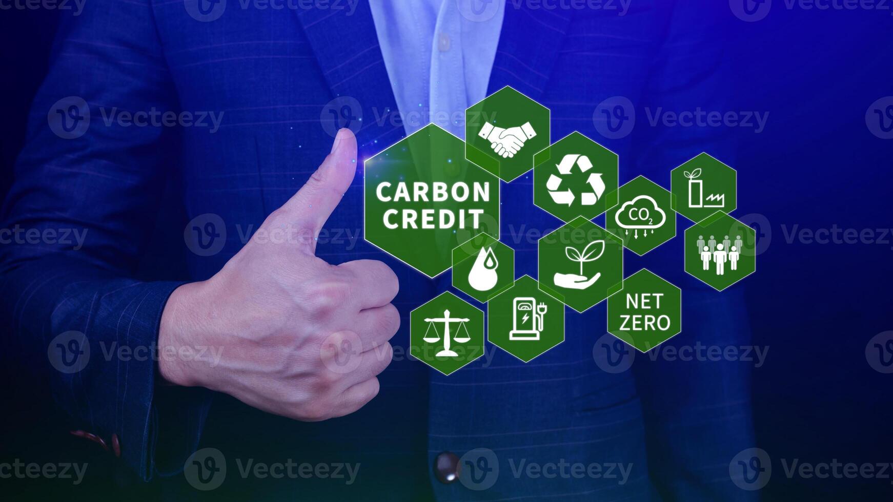 Green energy, Carbon credit market concept, Businessman holding Carbon credit icon, Net zero, Green energy icon. Carbon Neutral in industry Net zero emission eco energy. photo