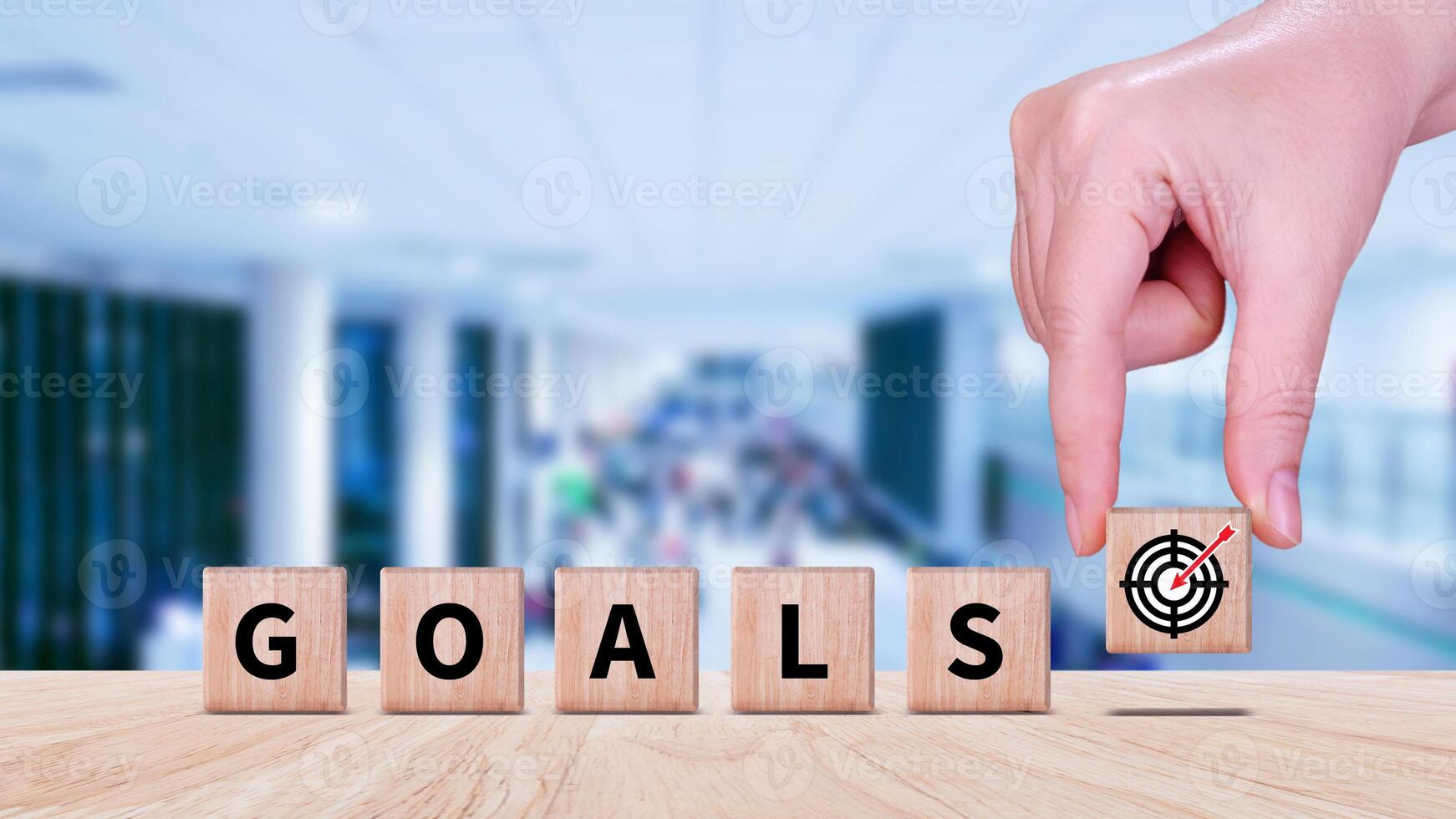 Hands place virtual target board and arrows on wooden block, Business ...