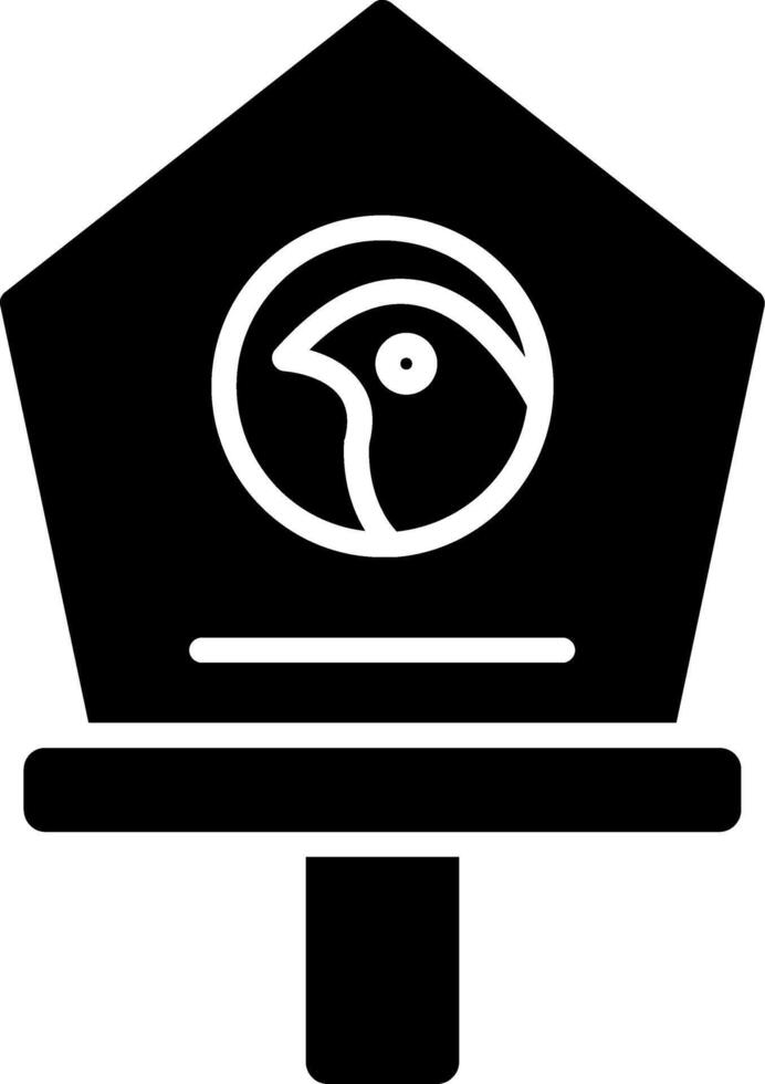 icono de glifo de casa de pájaro vector