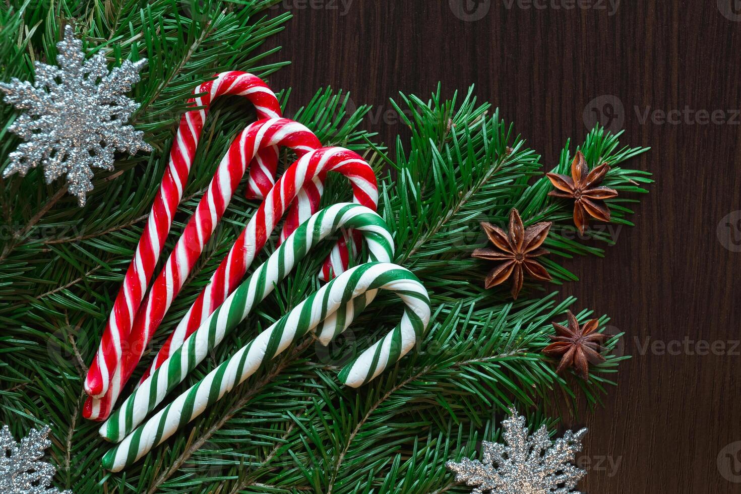 Christmas card. Candies, spruce, candy photo