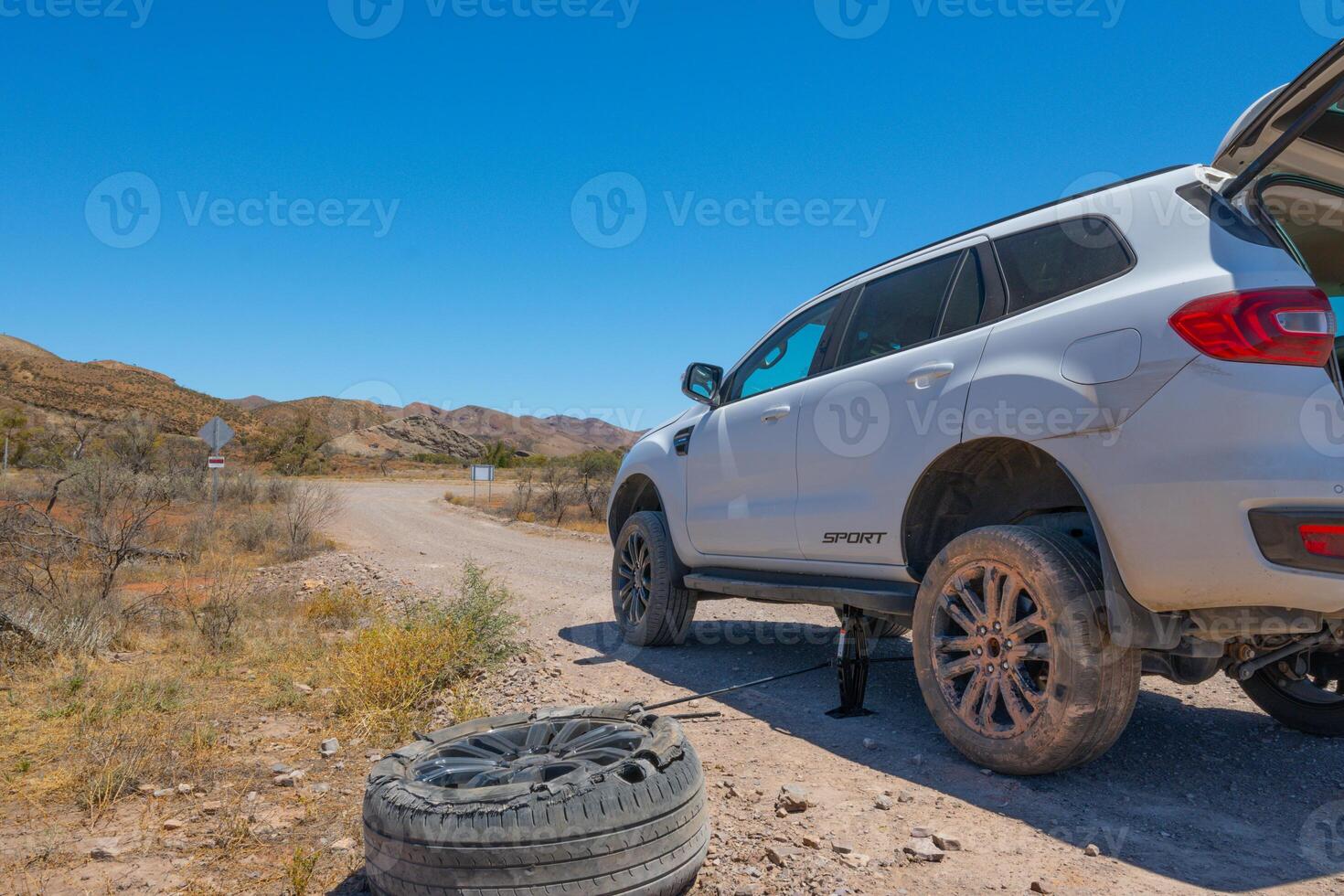Flat Tire on Dusty Road photo