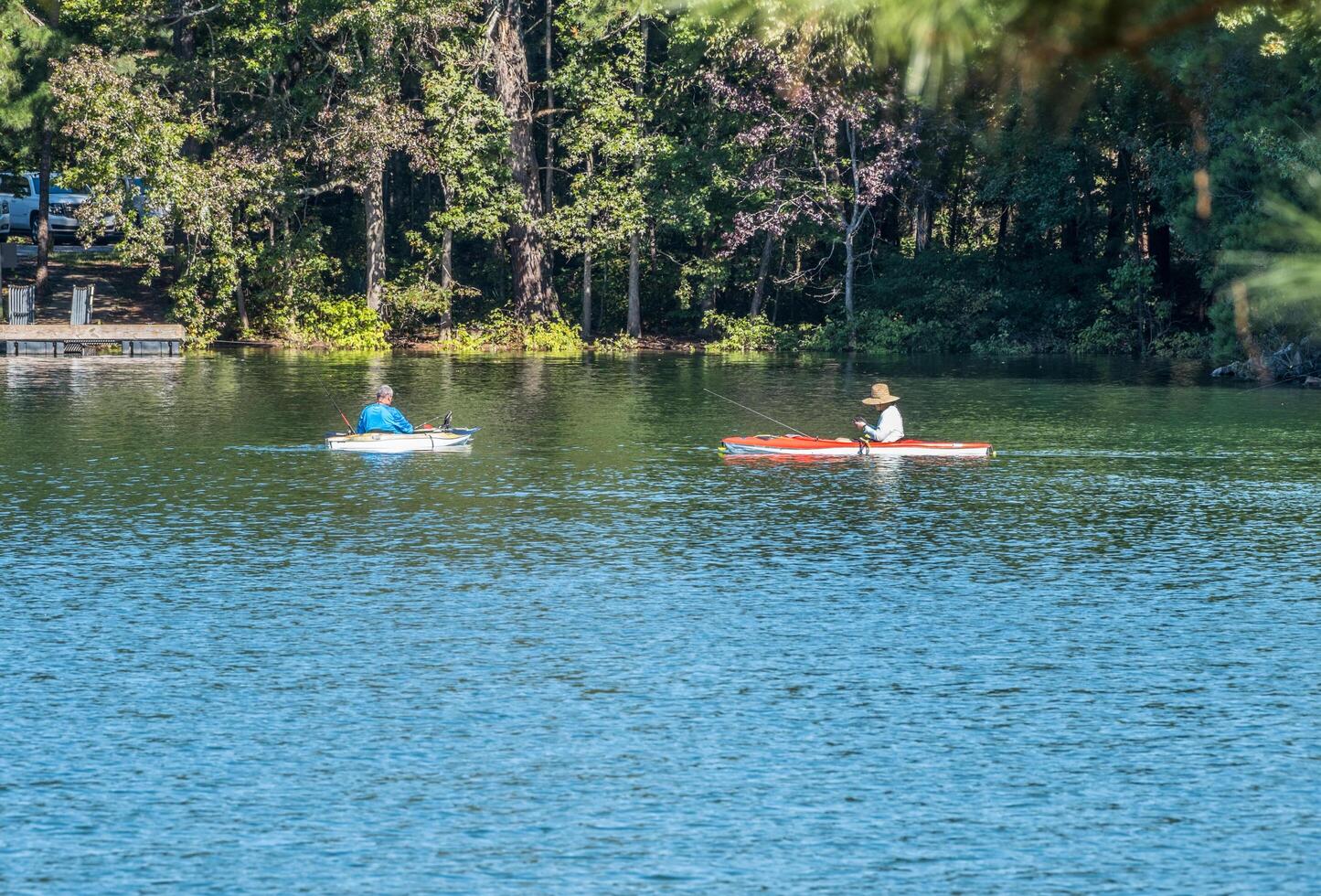 Fishing on the lake in kayaks photo