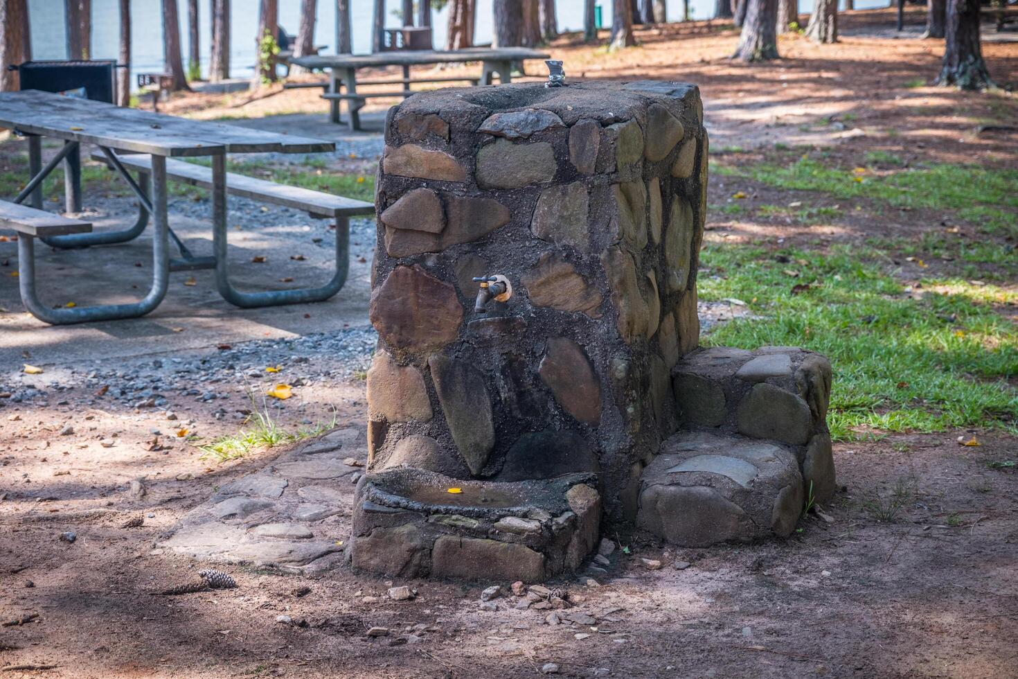 Old stone drinking fountain photo