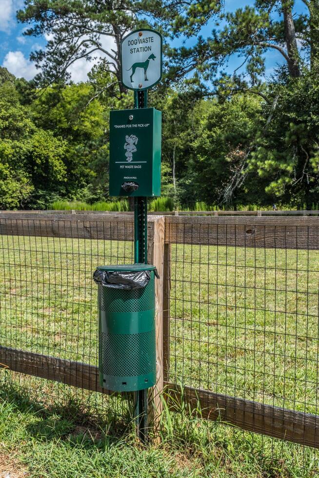 Dog waste station in the park photo