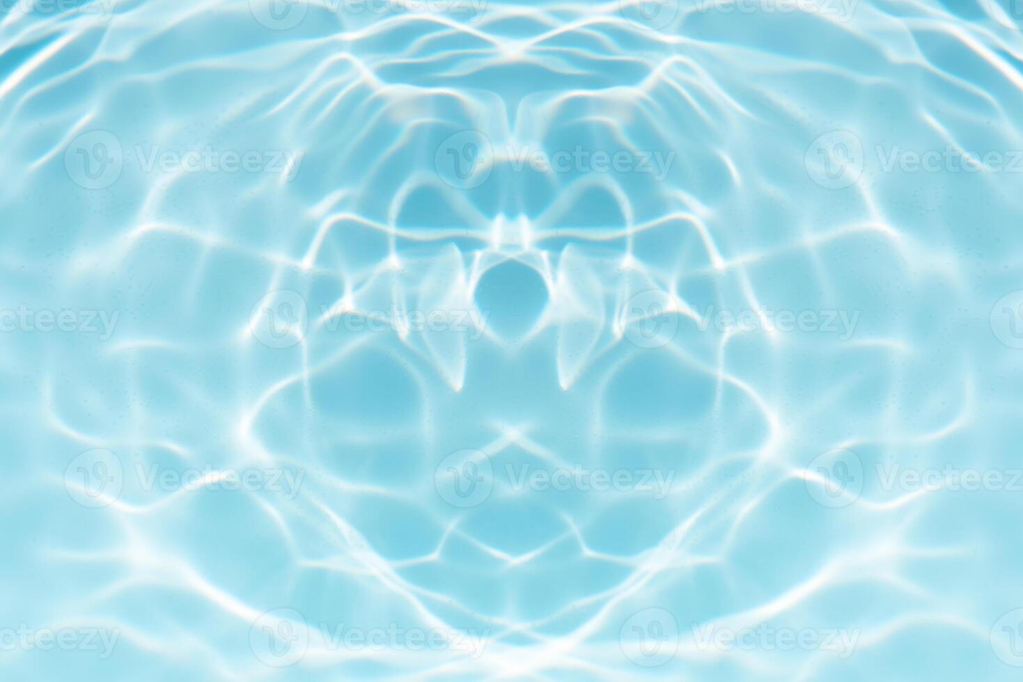 Bluewater waves on the surface ripples blurred. Defocus blurred transparent blue colored clear calm water surface texture with splash and bubbles. Water waves with shining pattern texture background. photo