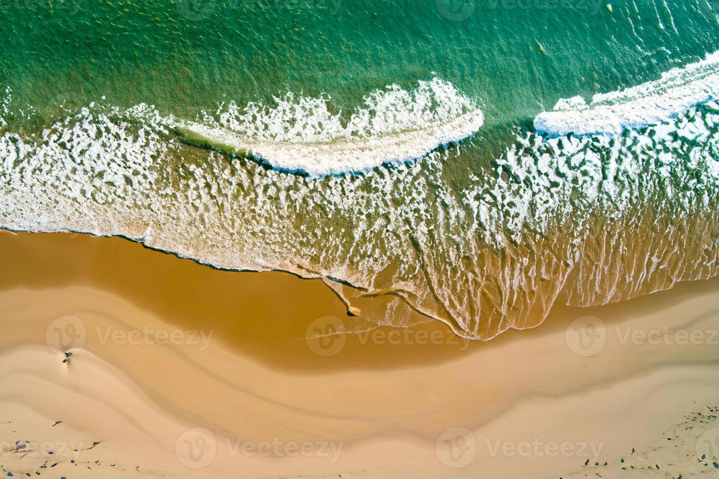 Horizon Haven Aerial Serenity Captures Beautiful Beach Sand from Above, a Tranquil Tapestry of Coastal Beauty photo