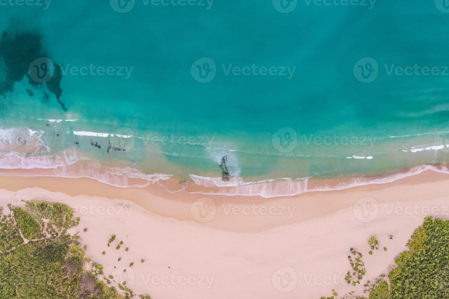 Aerial Perspective Captures Beautiful Beach Sand from Above and High, A Tranquil Vista of Coastal Bliss photo