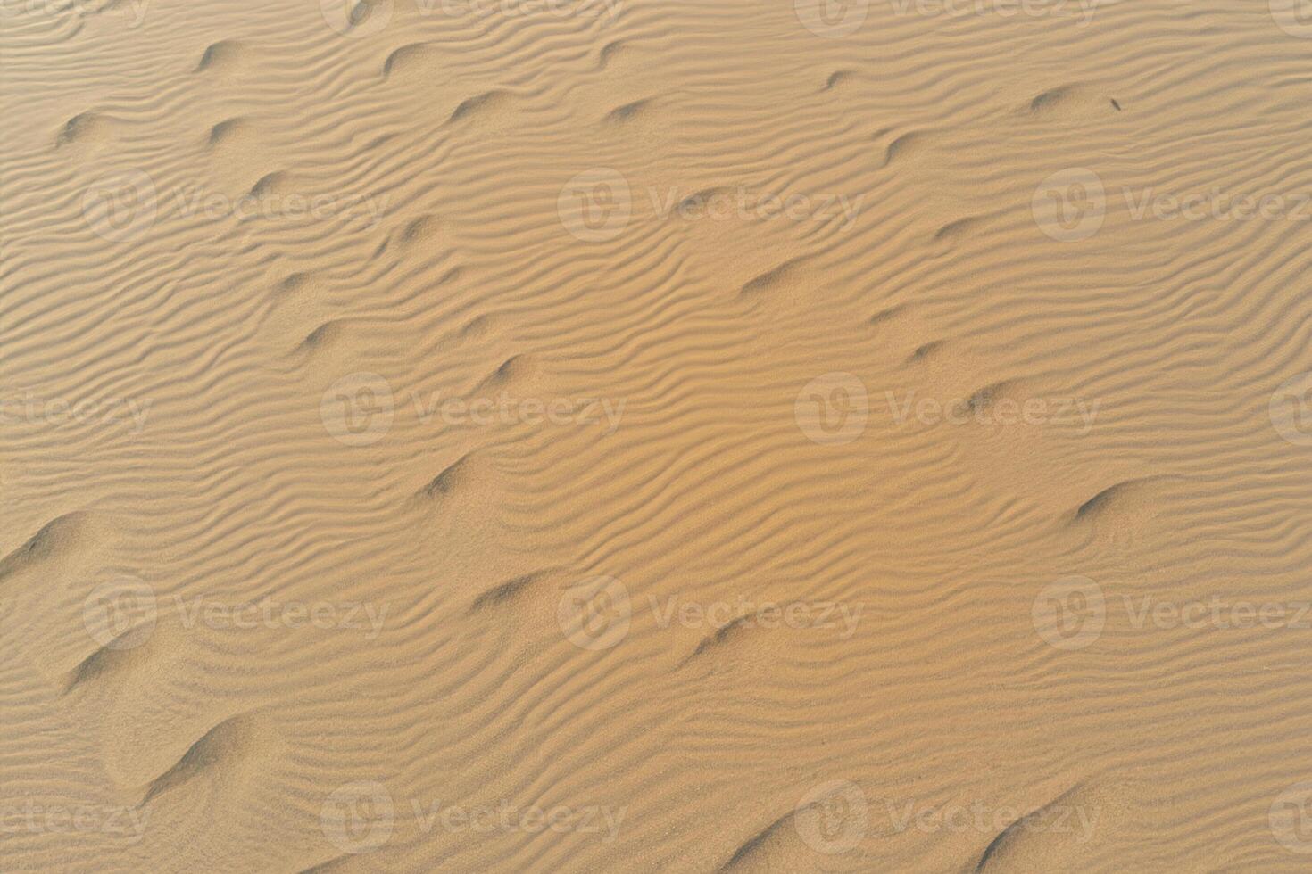 Horizon Haven Aerial Serenity Captures Beautiful Beach Sand from Above, a Tranquil Tapestry of Coastal Beauty photo