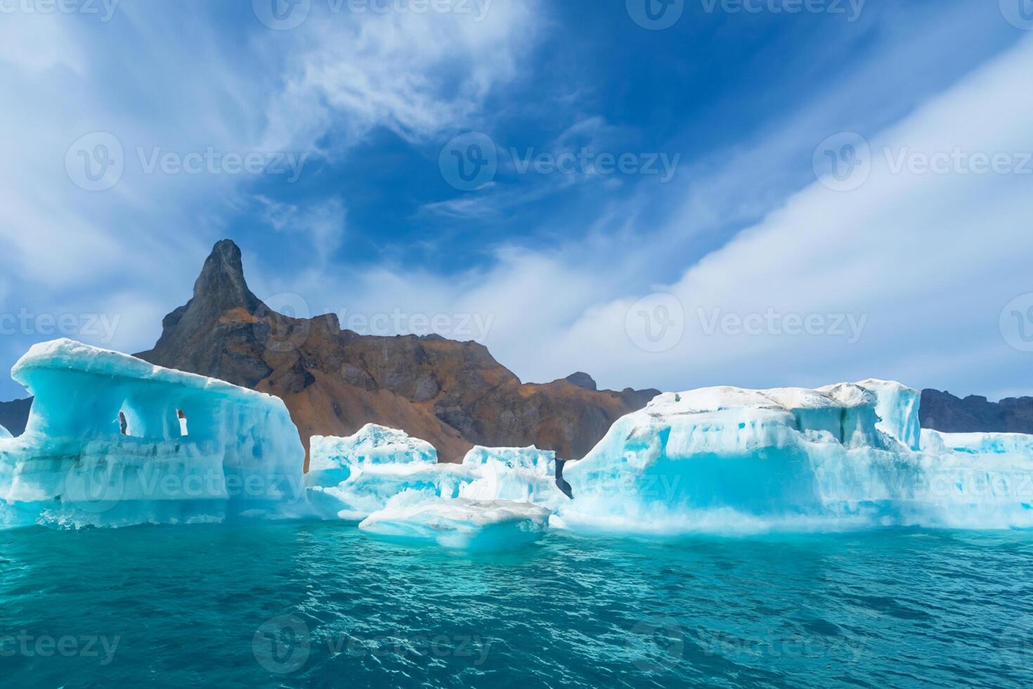 Majestic Ice Cliffs Crowned by a Cool Atmosphere, Framed by the Beautiful Sea and Sky, Conjuring a Harmonious Panorama of Nature's Icy Grandeur and Oceanic Splendor photo