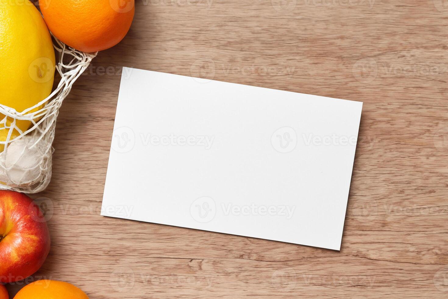 Card and White Paper Mockup Harmonized with Fresh Fruit, Crafting a Visual Symphony of Artful Design and Culinary Delight, Where Wholesome Ingredients Merge in a Feast of Vibrant Imagery photo