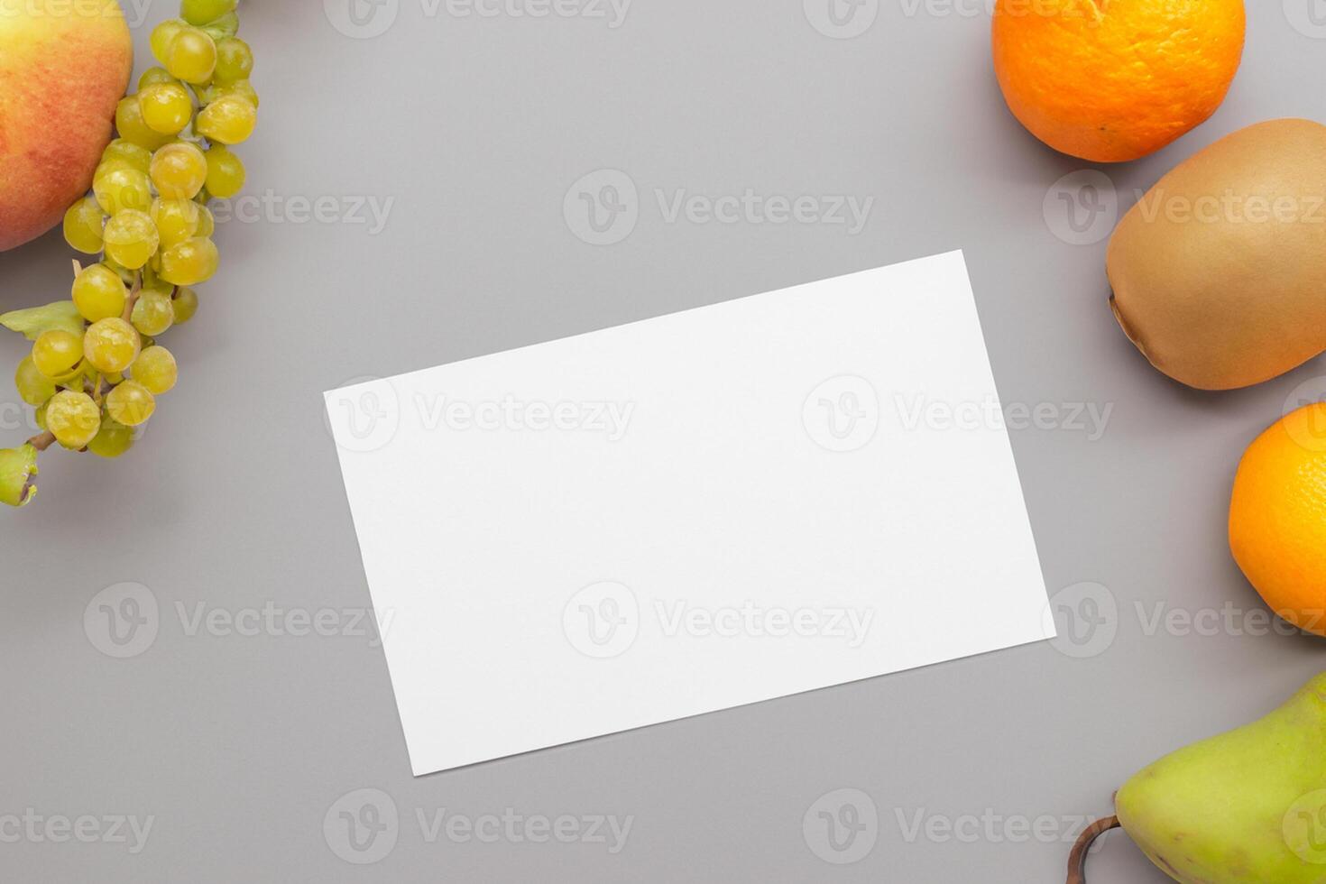 Card and White Paper Mockup Harmonized with Fresh Fruit, Crafting a Visual Symphony of Artful Design and Culinary Delight, Where Wholesome Ingredients Merge in a Feast of Vibrant Imagery photo