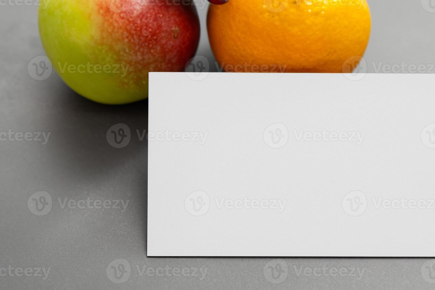 Card and White Paper Mockup Harmonized with Fresh Fruit, Crafting a Visual Symphony of Artful Design and Culinary Delight, Where Wholesome Ingredients Merge in a Feast of Vibrant Imagery photo