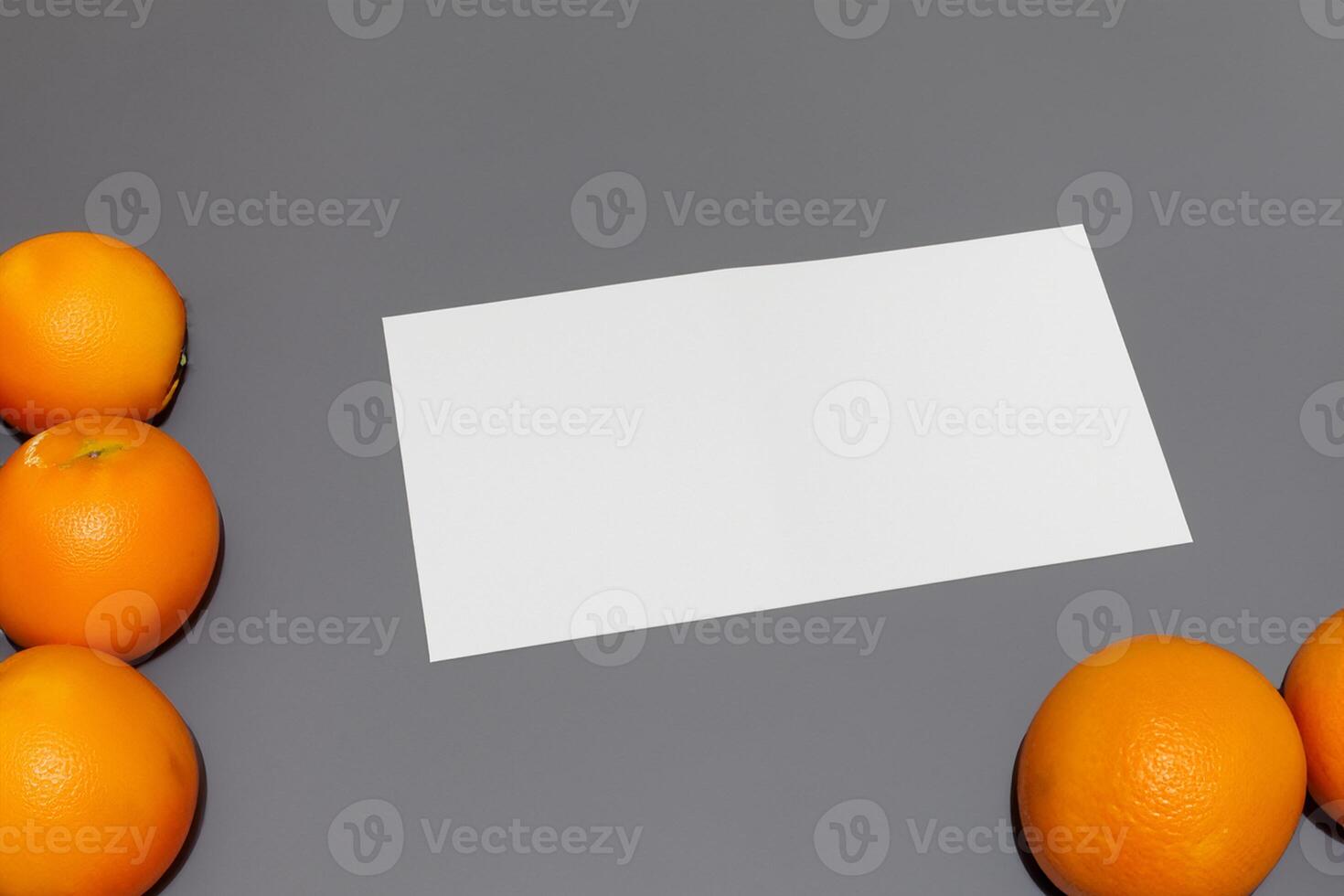 Generated imageWhite Paper Mockup Enlivened by the Zesty Aura of Fresh Oranges, Crafting a Visual Symphony of Culinary Opulence and Wholesome Design photo