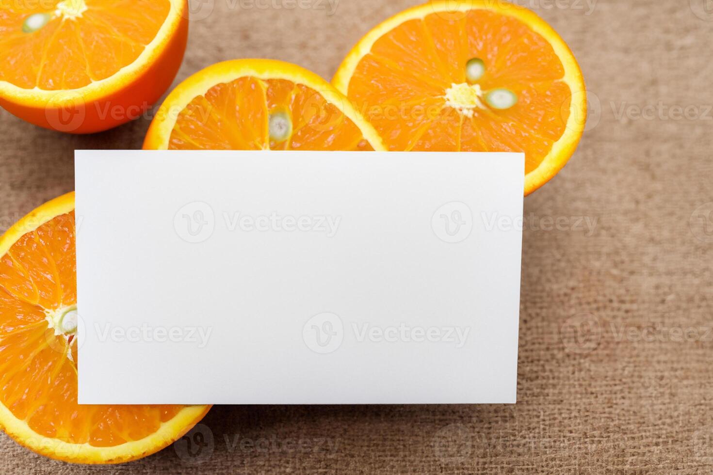 Generated imageWhite Paper Mockup Enlivened by the Zesty Aura of Fresh Oranges, Crafting a Visual Symphony of Culinary Opulence and Wholesome Design photo