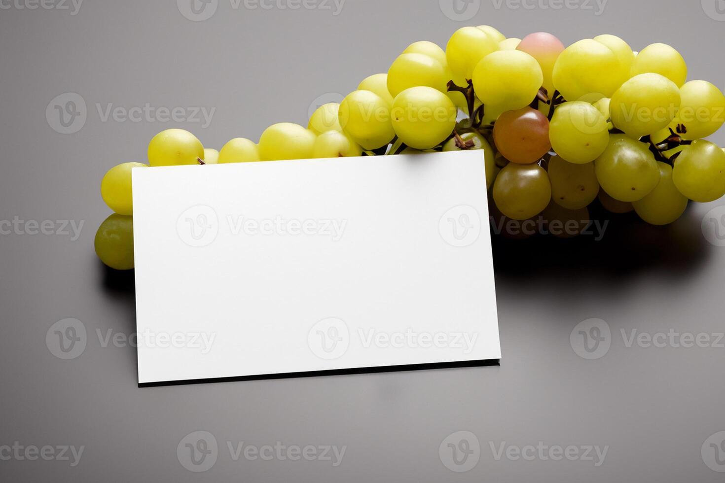 White Paper Mockup Enhanced by the Juicy Allure of Fresh Grapes, Crafting a Visual Symphony of Culinary Elegance and Wholesome Imagery, Where Graphic Design Flourishes in a Feast of Vibrant Creativity photo