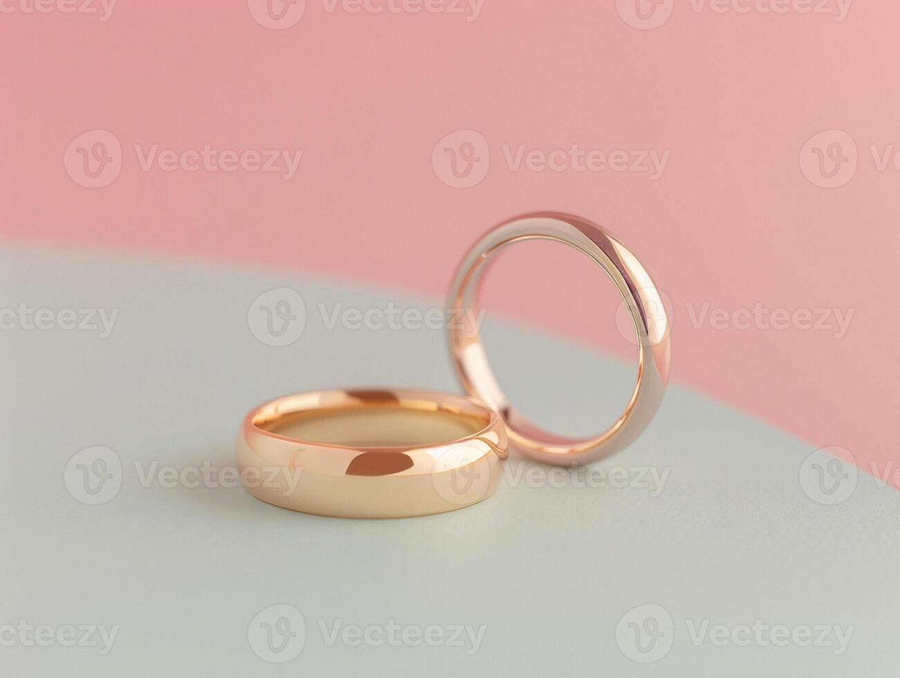 Two gold wedding rings on a neutral background. Aesthetic macro photo