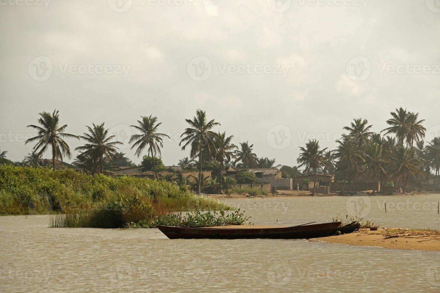 fishing boats at the mono river, grand popo, benin photo