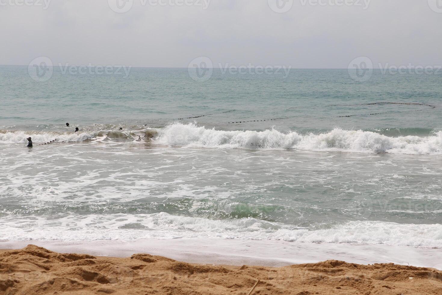 fishermen in the sea photo