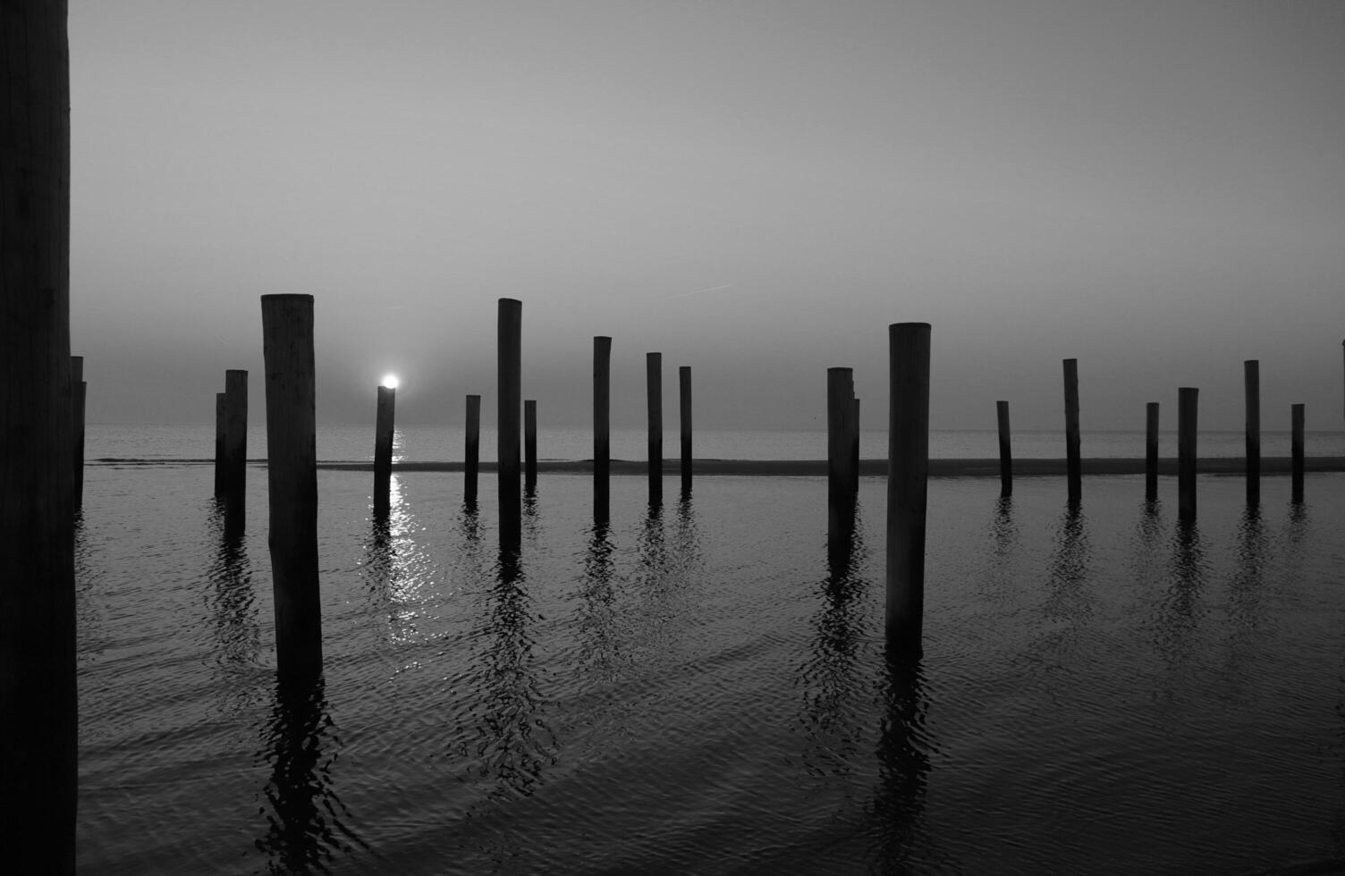 sunset in the pole village of Petten in the Netherlands photo