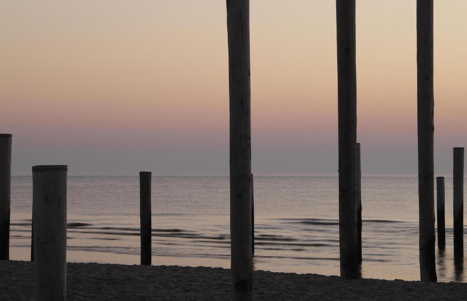 sunset in the pole village of Petten in the Netherlands photo