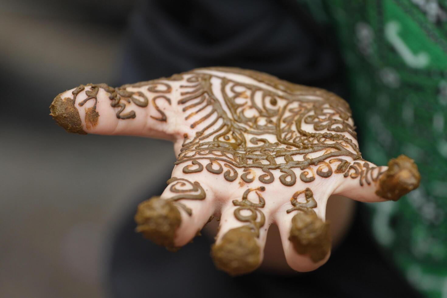 henna or mehndi tattoos on hands photo