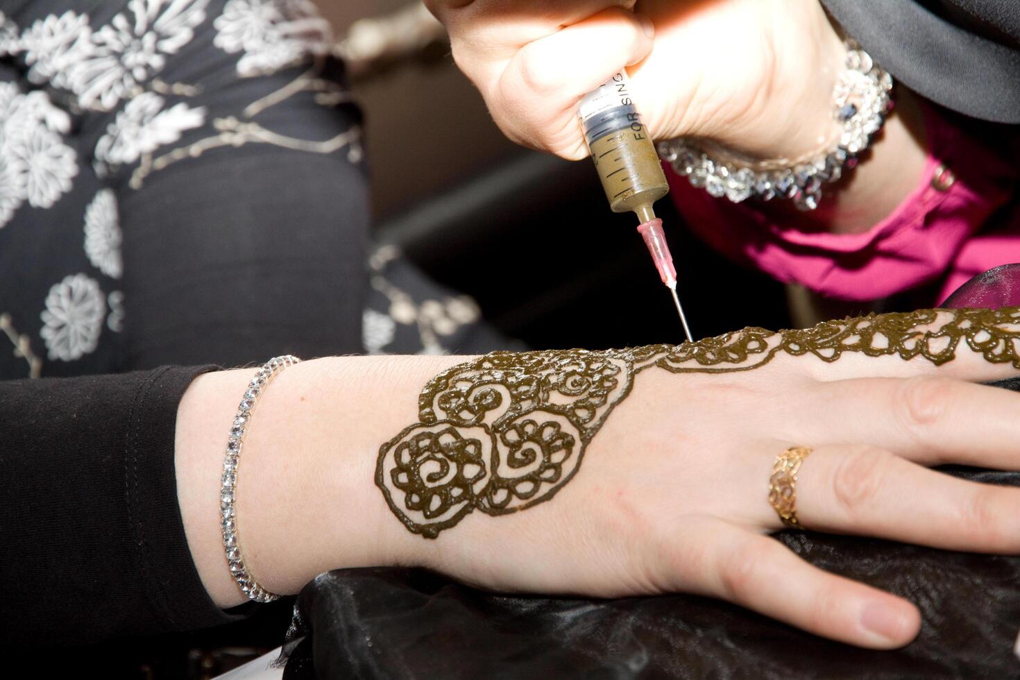 henna or mehndi tattoos on hands photo