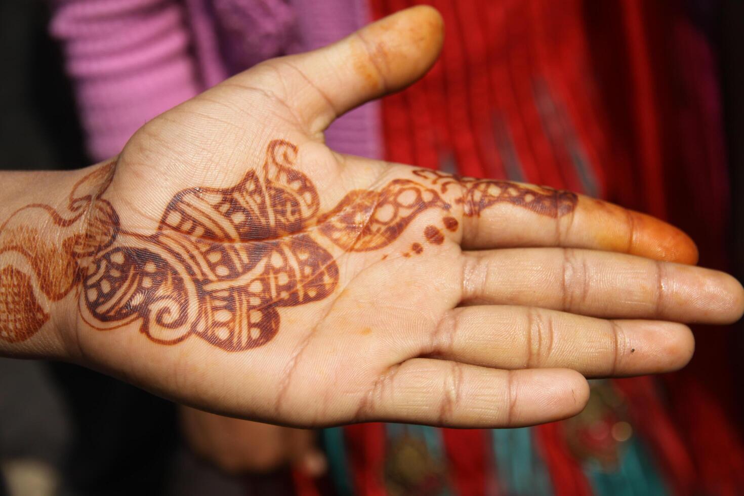 henna or mehndi tattoos on hands photo