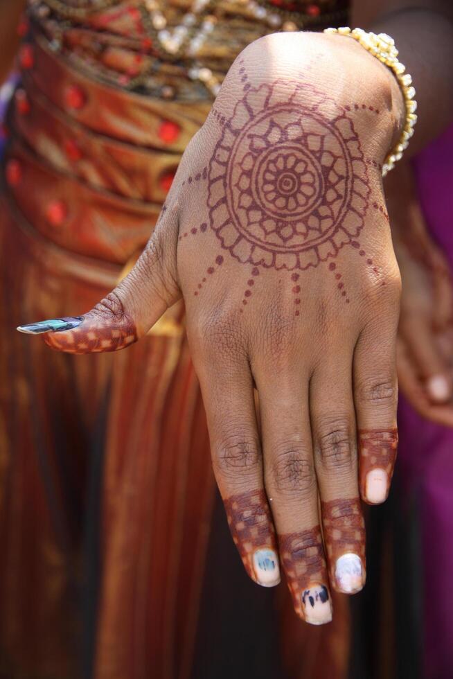 henna or mehndi tattoos on hands photo