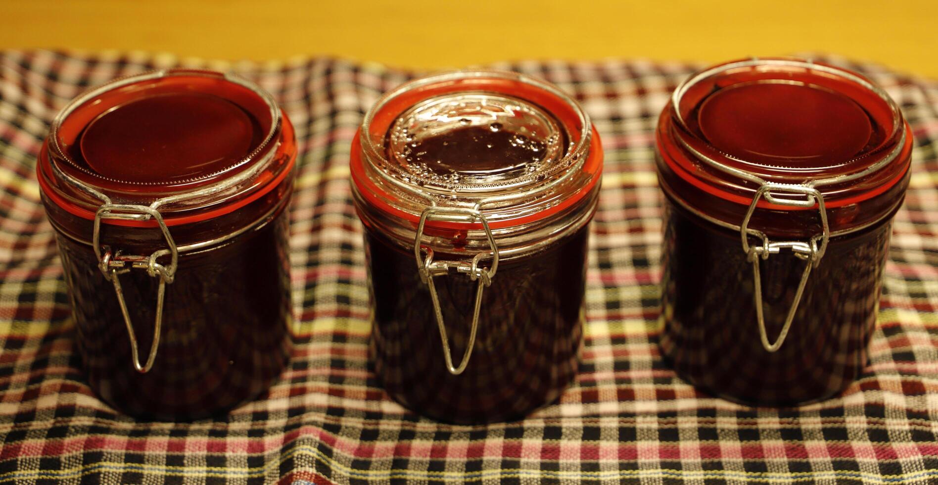 3 jam jars with homemade jam photo