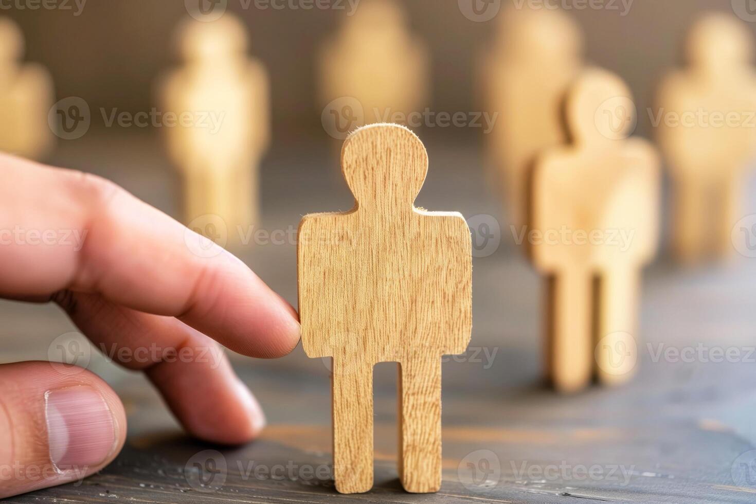 choosing standout wooden figure among crowd of potential job candidates photo