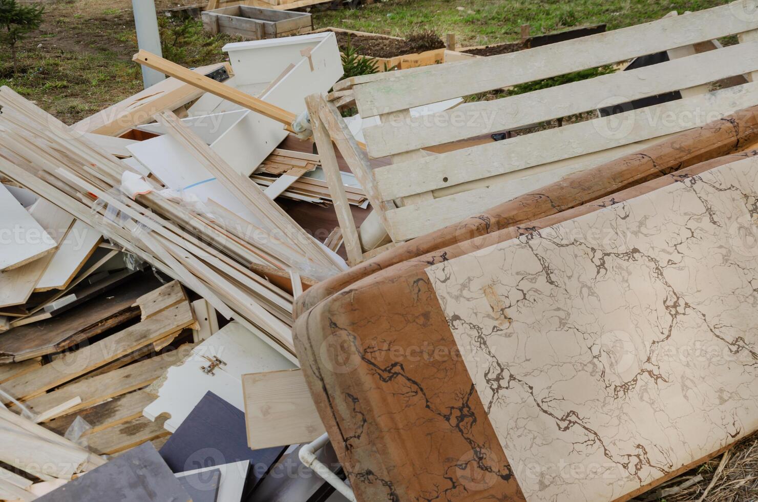 Garbage is lying in the city next to residential buildings photo