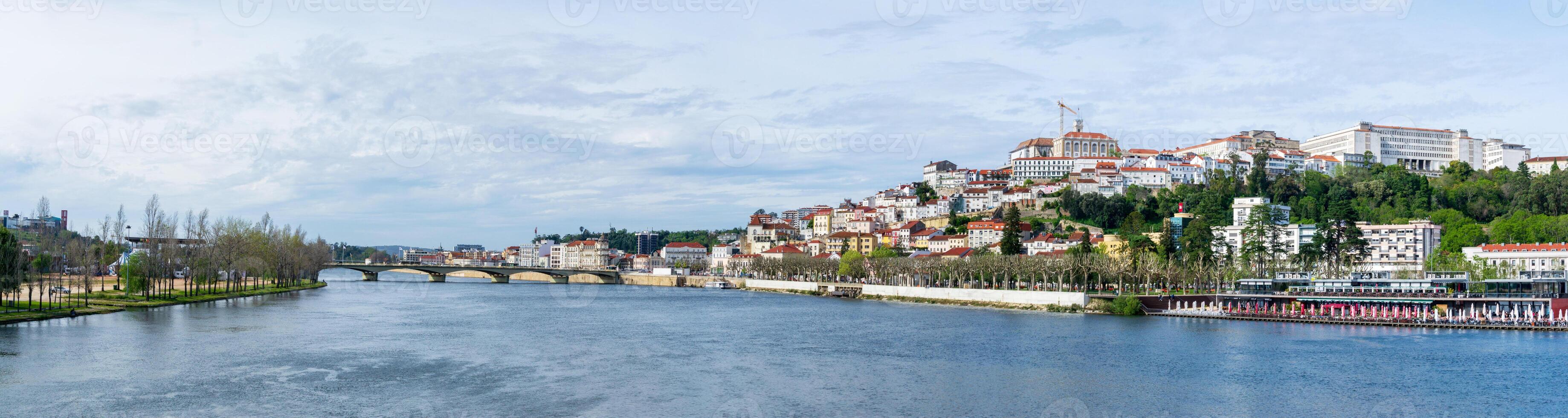 Panorama of the city of Coimbra in Portugal. View of the center and the Mondego River. Cityscape. photo