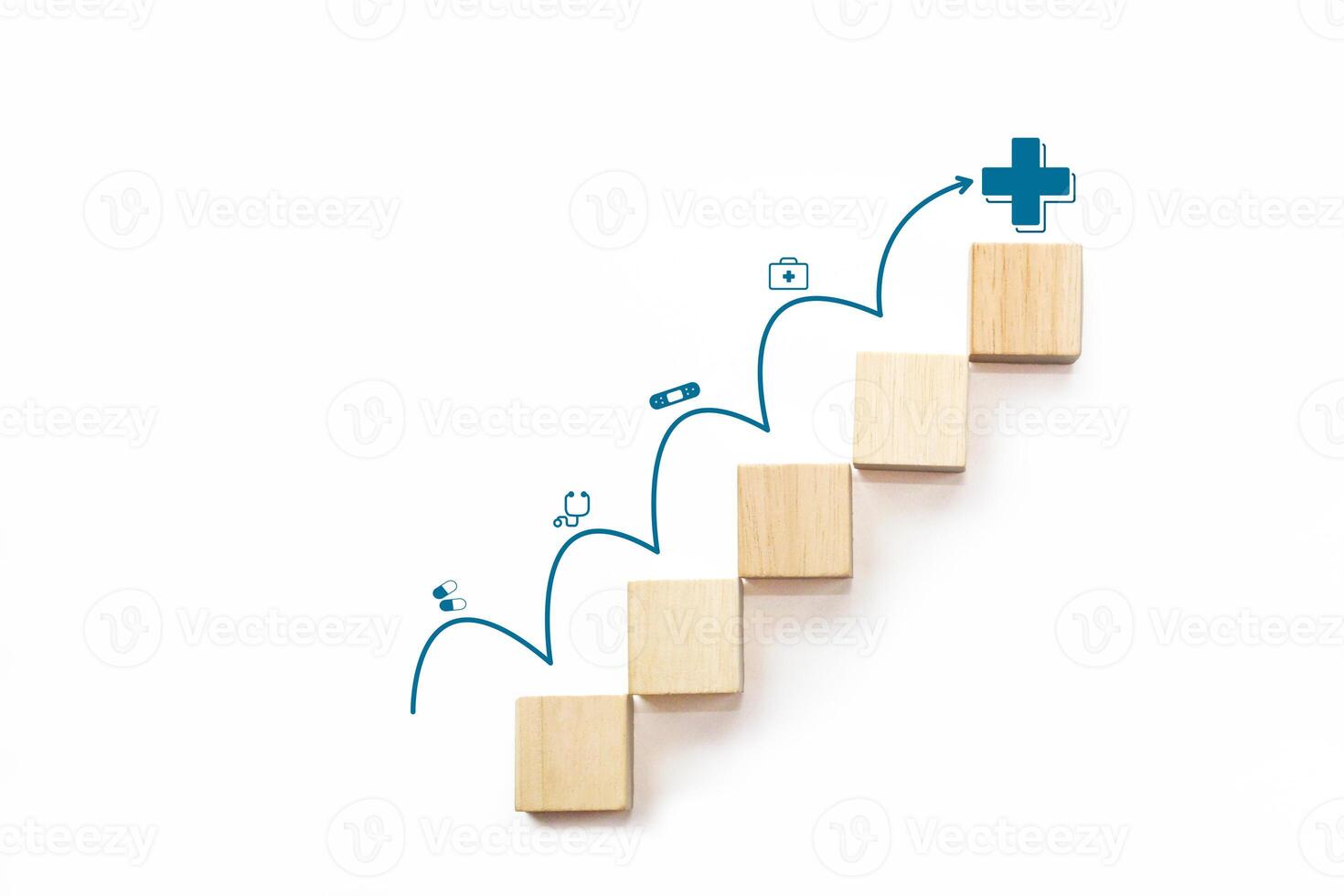 Wooden block stacking as step stair with arrow rising on white background and medical icons on the top. Health care, health insurance and treatment concept. photo