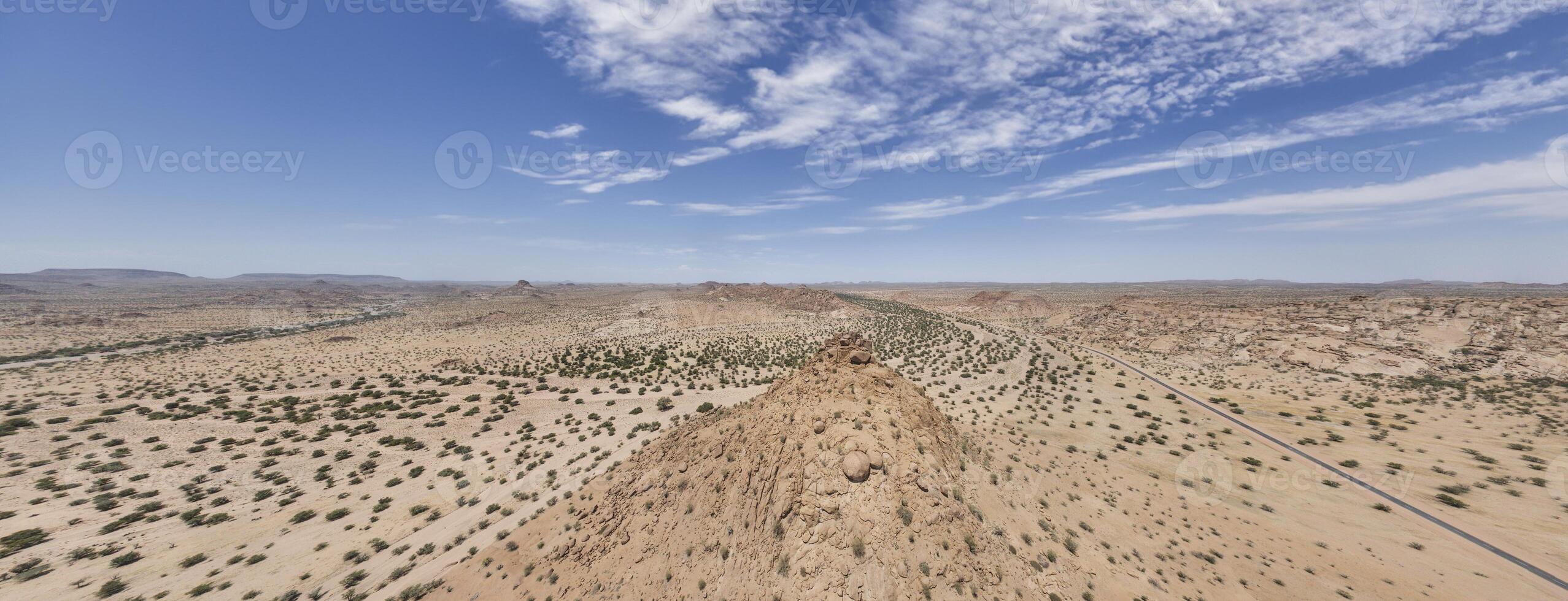 Drone panorama over the Namibian desert landscape near Twyfelfontein during the day photo