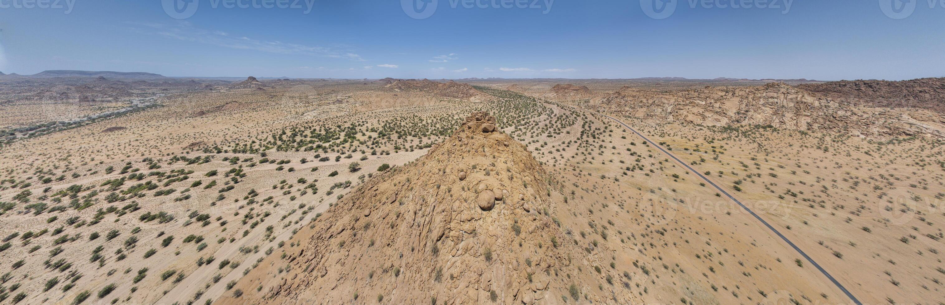 Drone panorama over the Namibian desert landscape near Twyfelfontein during the day photo