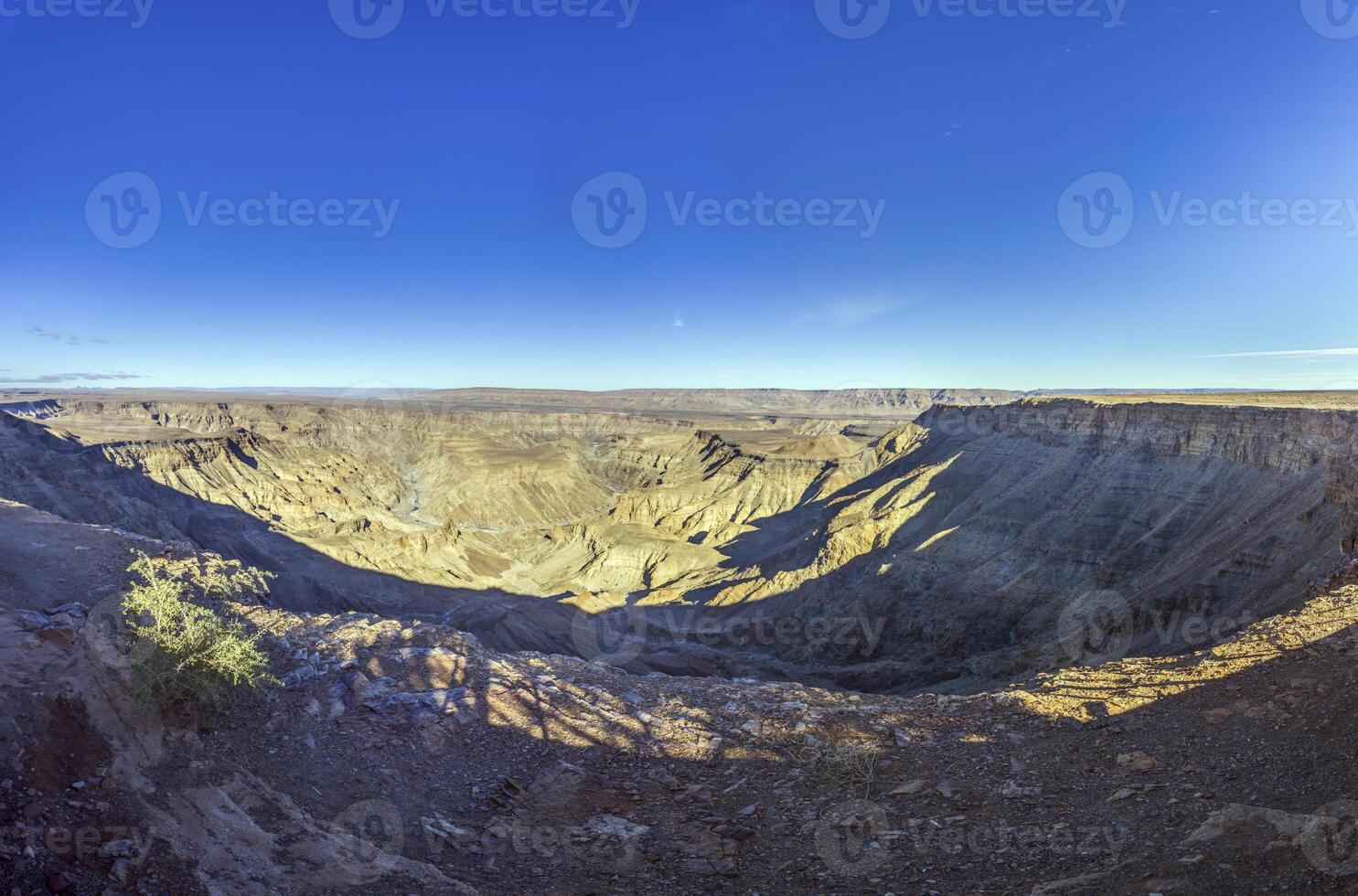 Panoramic picture of the Fish River Canyon in Namibia taken from the upper edge of the south side photo