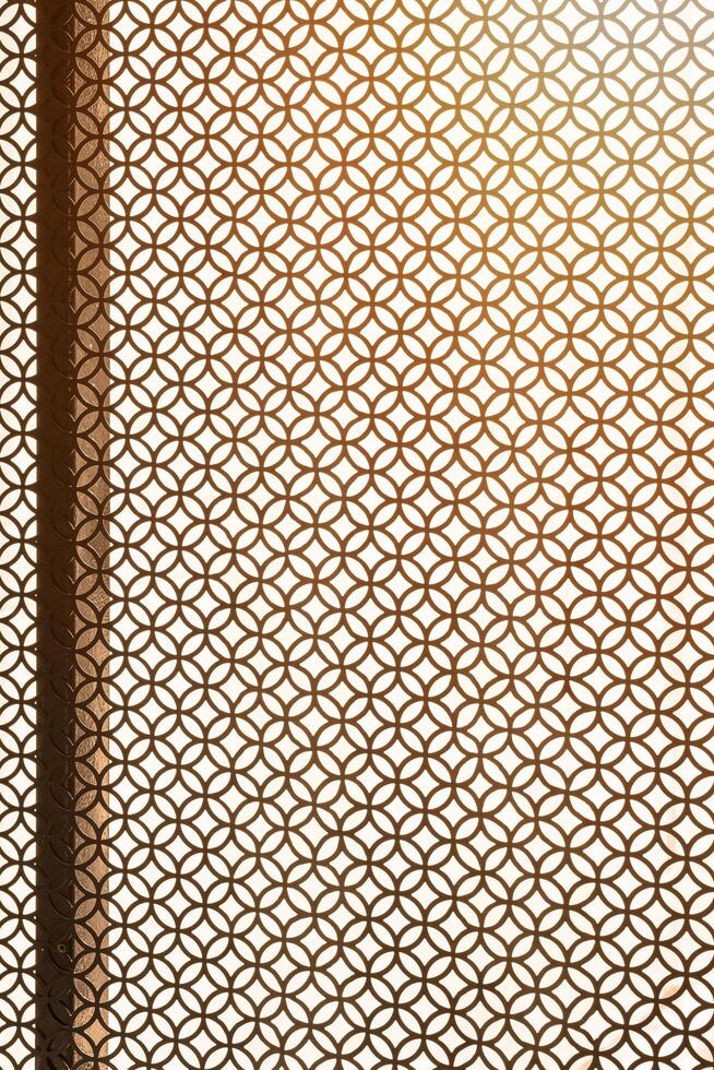 Abstract pattern background of expanded metal grating wall decoration of vintage house in industrial loft style, view from inside room and vertical frame photo