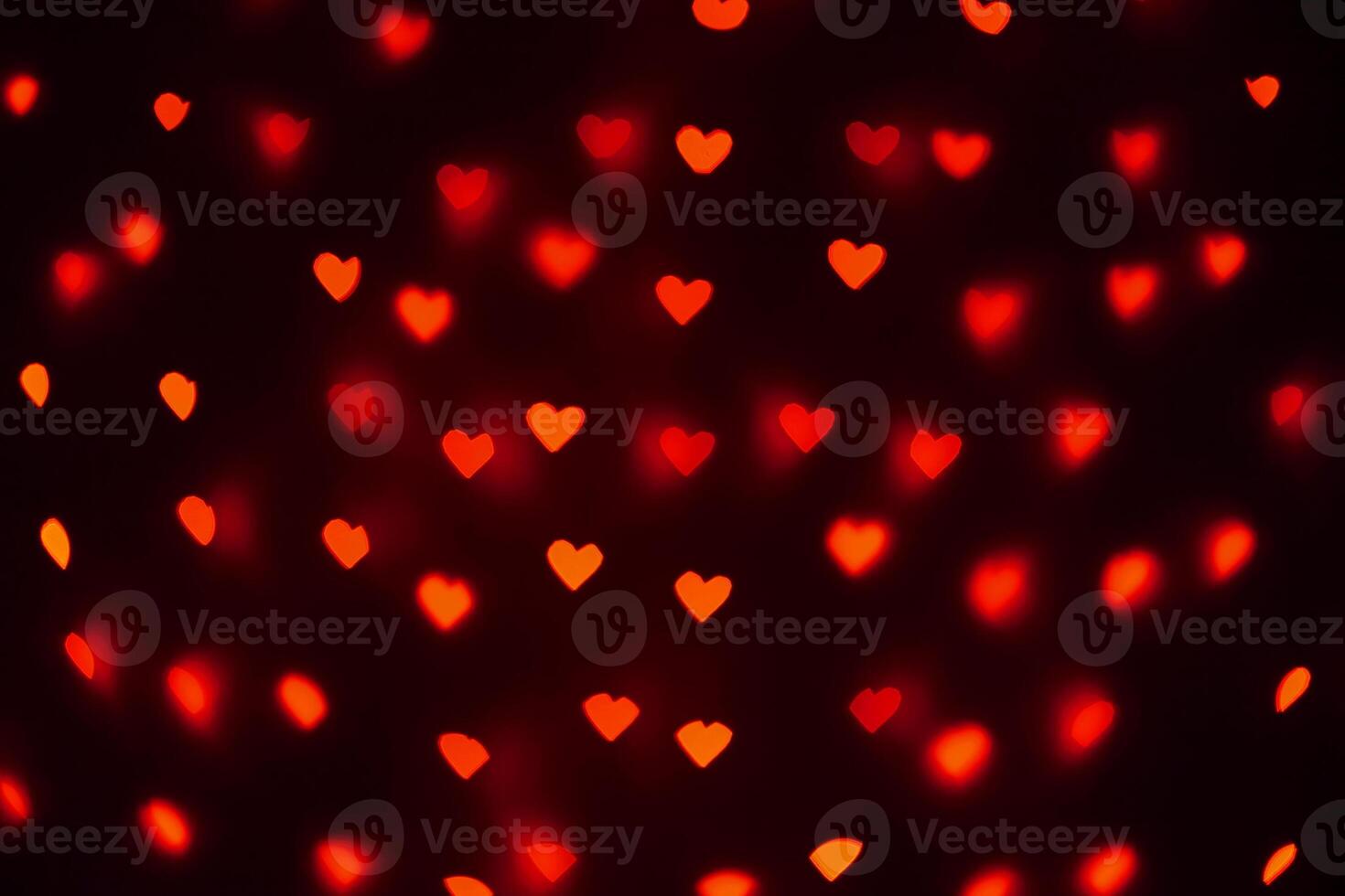 beautiful hearts made of lights on a blurred background photo