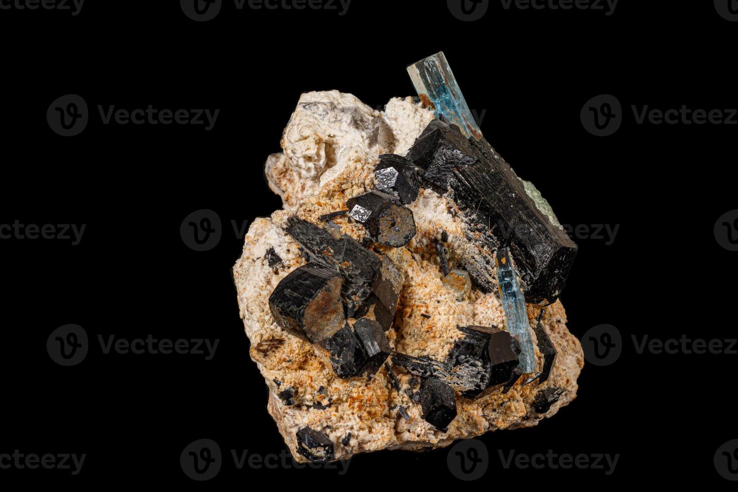 Macro stone mineral tourmaline aquamarine with a black background photo
