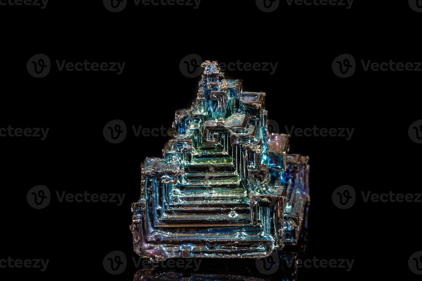 Macro of the stone bismuth mineral on a black background photo