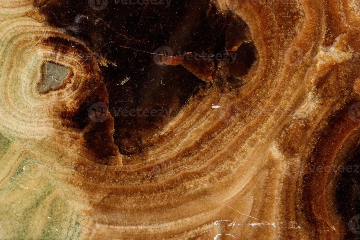 Macro stone mineral onyx marble on a black background photo