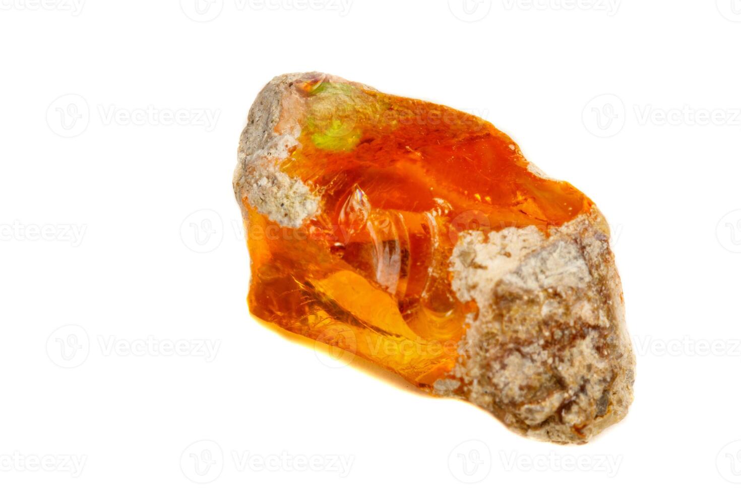 Macro Opal mineral stone in rock on white background photo