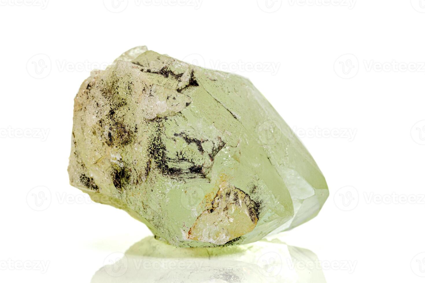 Macro stone mineral Datolite on a white background photo
