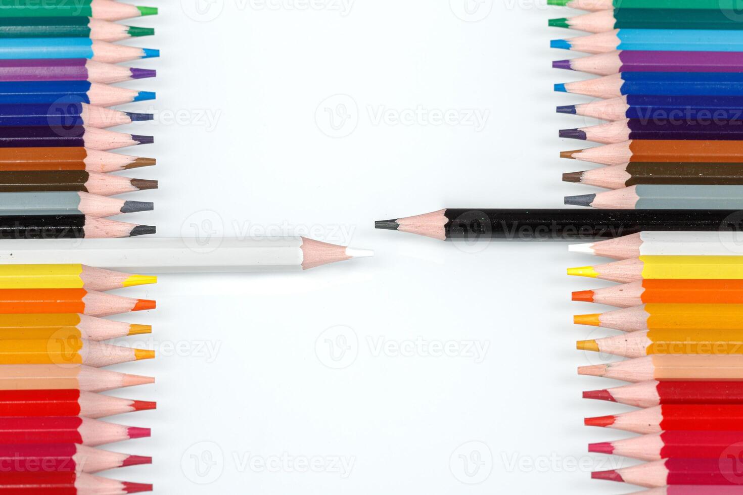 Multi-colored pencils in a row photo