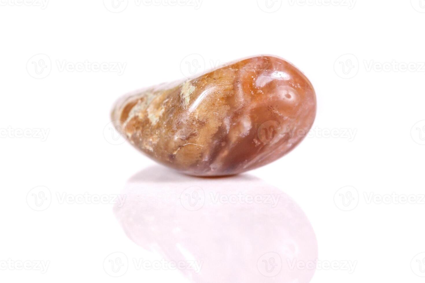 Macro mineral stone jasper on a white background photo