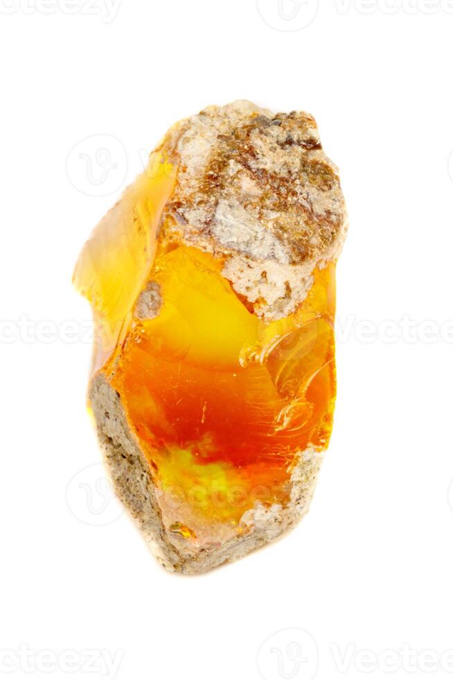 Macro Opal mineral stone in rock on white background photo