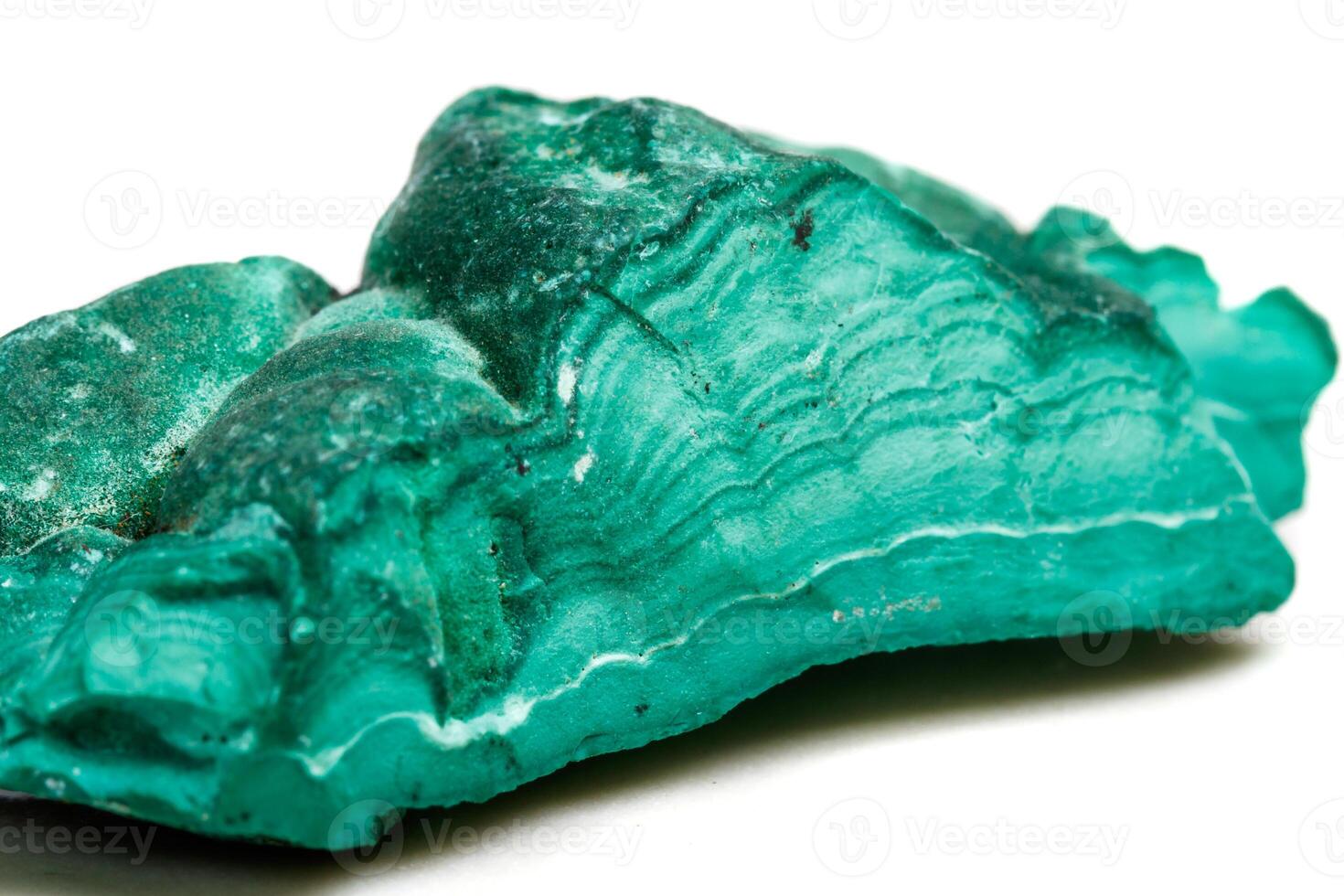Macro mineral stone Malachite in the rock on a white background photo