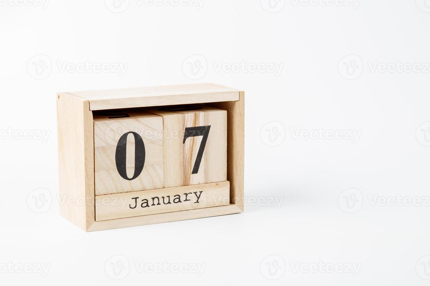 Wooden calendar January 07 on a white background photo