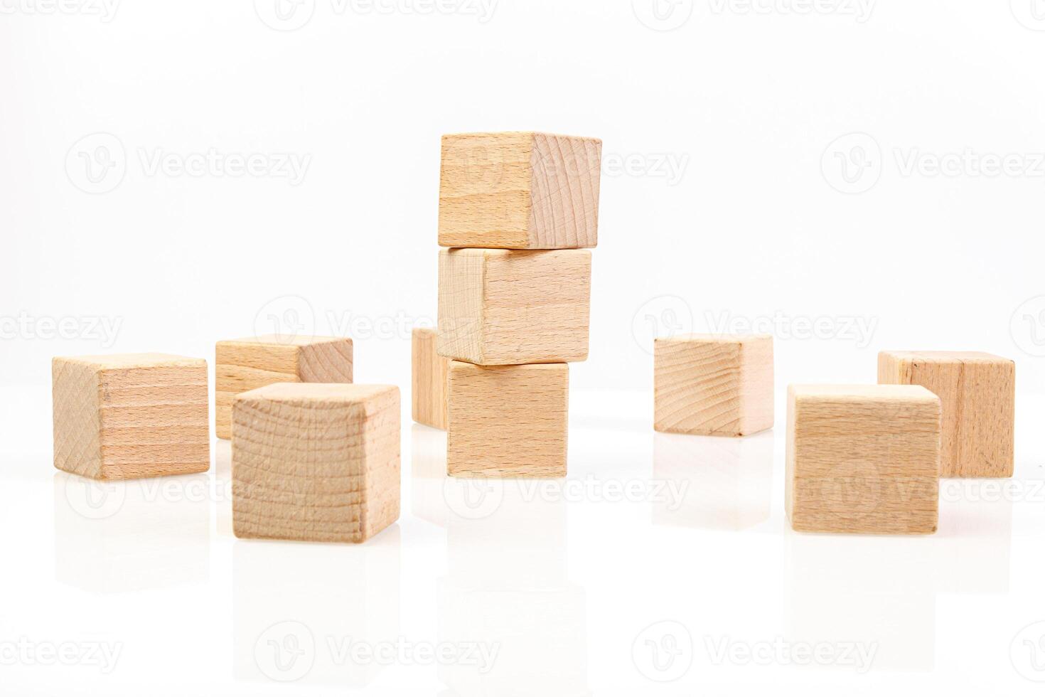 Wooden cubes on a white background photo