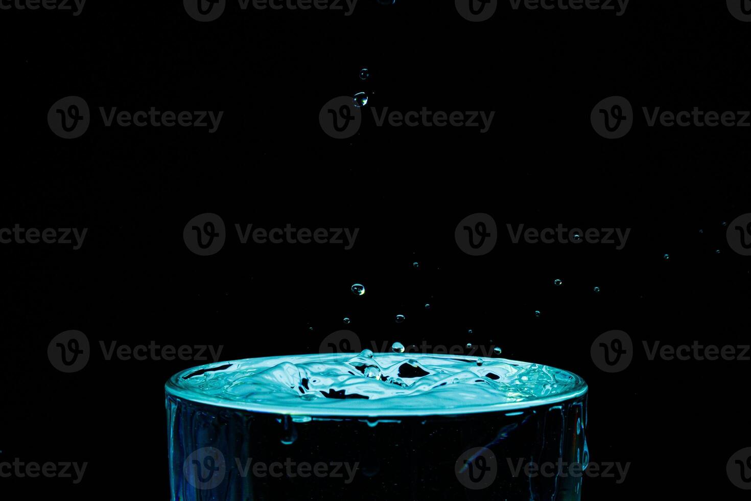 macro Beautiful drops in flight, colored drops photo